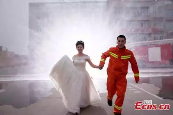 See How This Fire-Fighter Poses For His Wedding Photos With His Partner